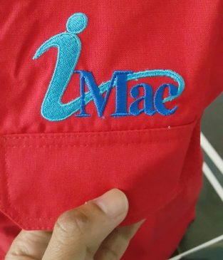 Baju seragam perusahaan PT Imaac , bahan kain maryland tropical